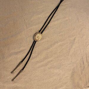 Vintage Oval Shaped Tooled Metal Bolo